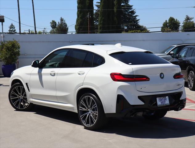 used 2025 BMW X4 car, priced at $60,945