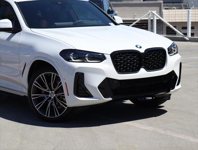 used 2025 BMW X4 car, priced at $60,945