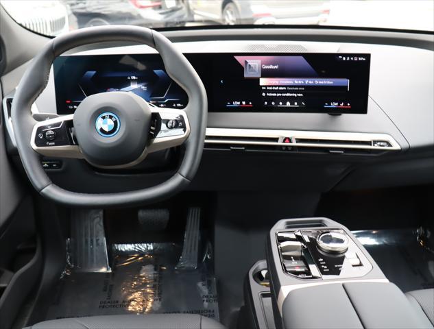 used 2024 BMW iX car, priced at $77,845