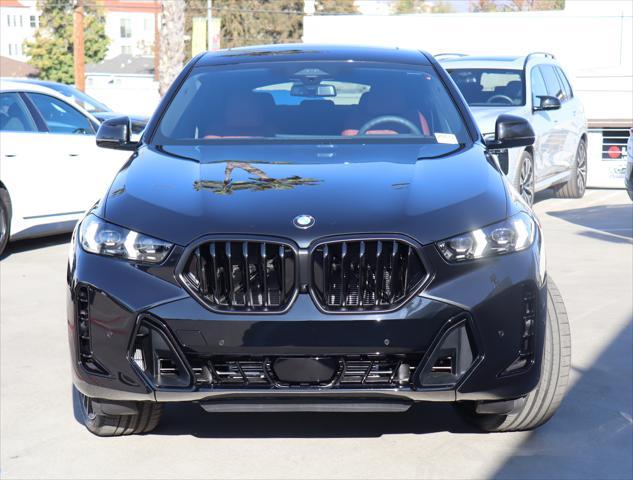 new 2025 BMW X6 car, priced at $82,575