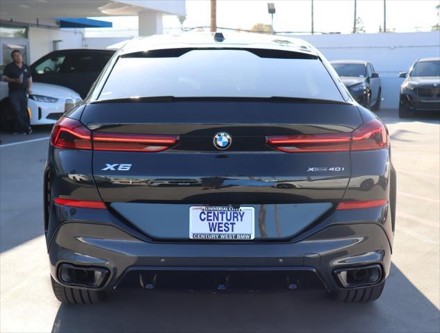 new 2025 BMW X6 car, priced at $82,575