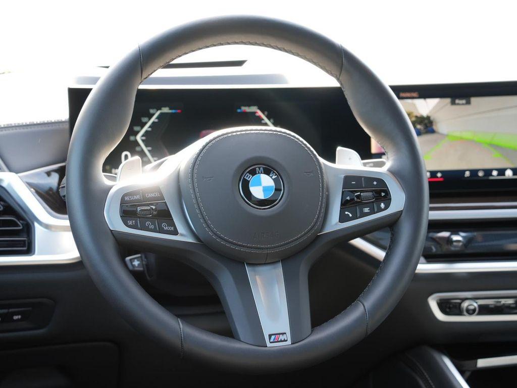used 2026 BMW X6 car, priced at $70,880