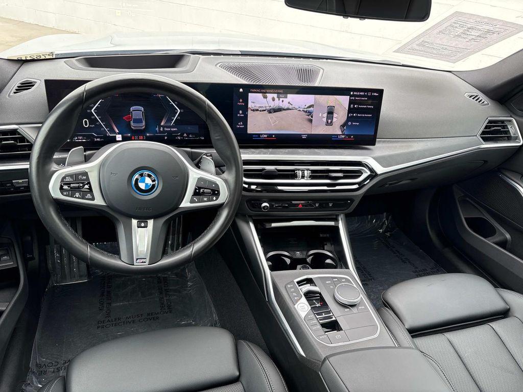 used 2024 BMW 330e car, priced at $33,880