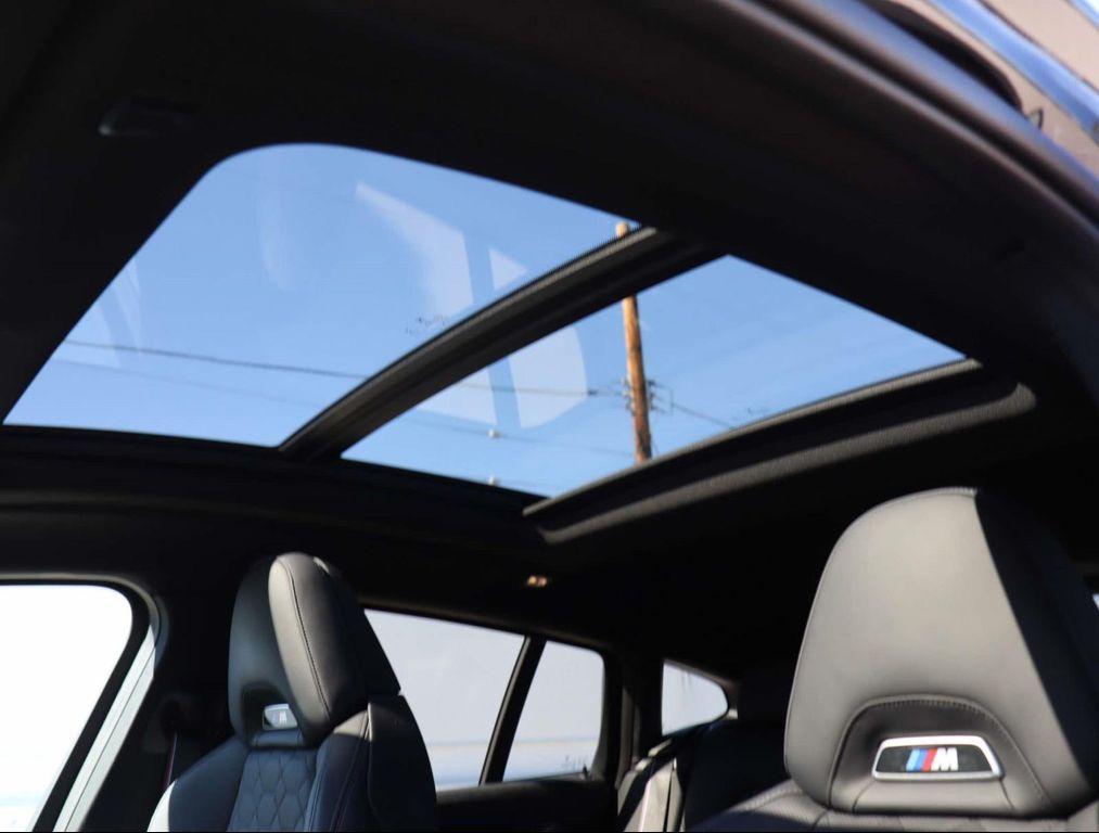 used 2022 BMW X4 M car, priced at $58,885