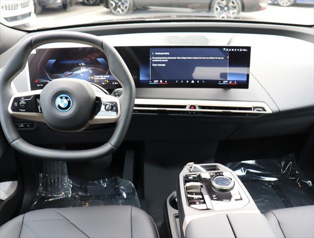 new 2025 BMW iX car, priced at $90,625