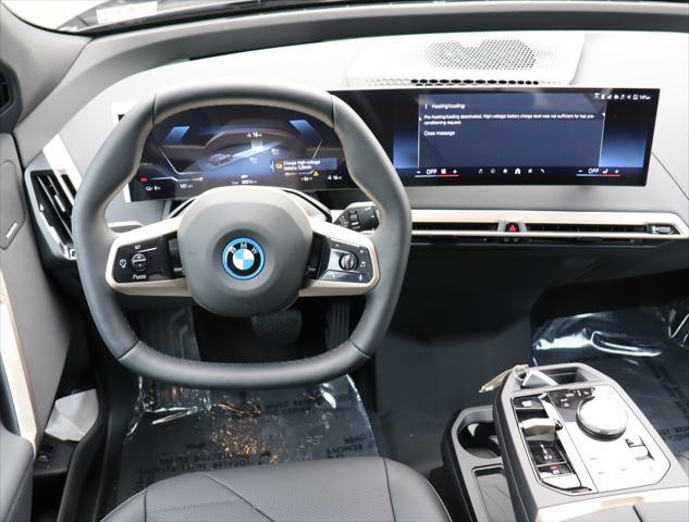 new 2025 BMW iX car, priced at $90,625