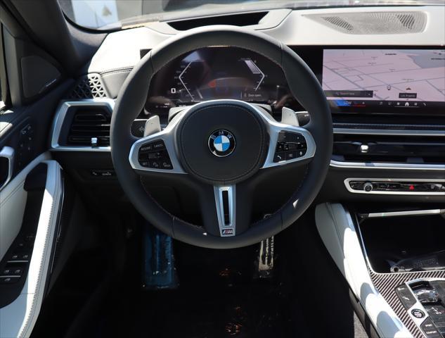 new 2025 BMW X6 car, priced at $106,925