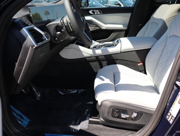 new 2025 BMW X6 car, priced at $106,925