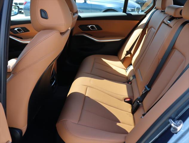 new 2025 BMW 330 car, priced at $49,975