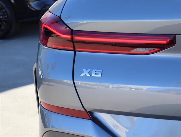 new 2025 BMW X6 car, priced at $104,195