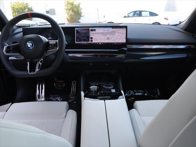 used 2024 BMW i5 car, priced at $75,995