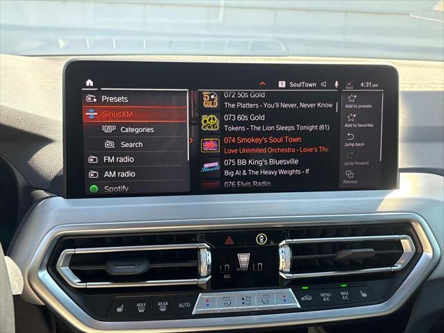 used 2025 BMW X4 car, priced at $52,520