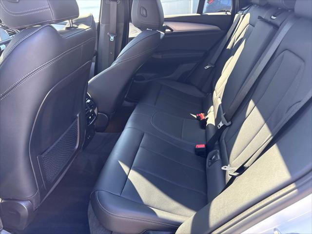 used 2025 BMW X4 car, priced at $52,520