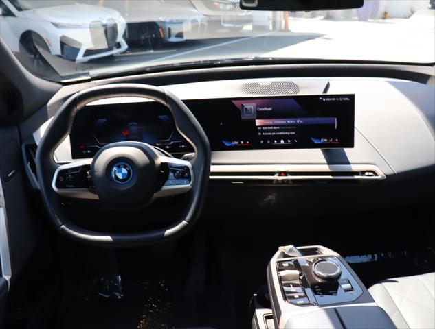 used 2024 BMW iX car, priced at $83,910