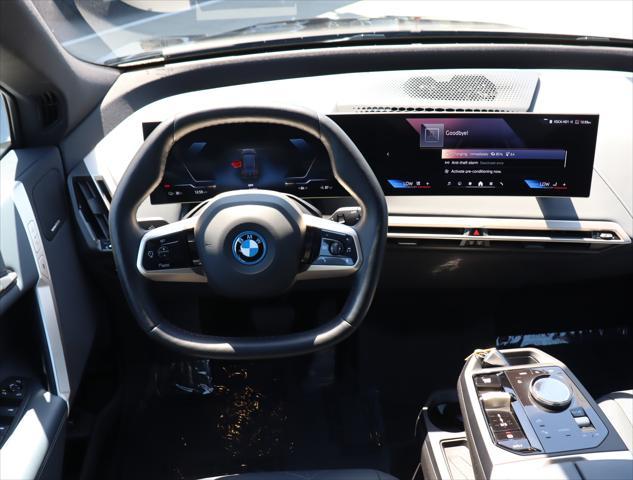 used 2024 BMW iX car, priced at $83,910