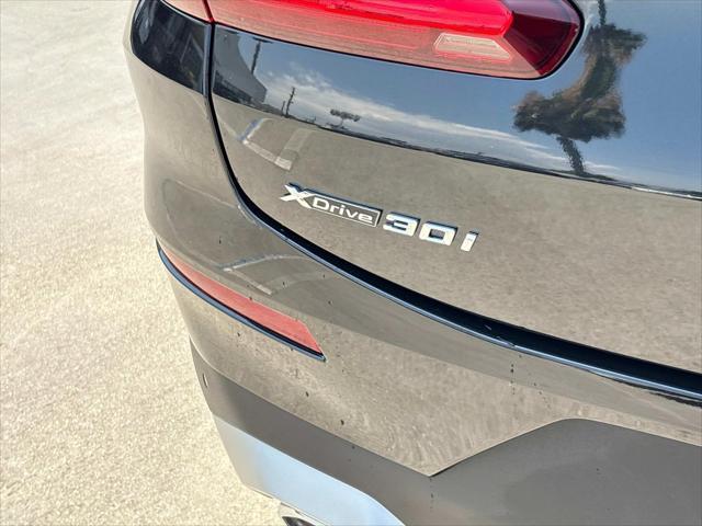 used 2024 BMW X4 car, priced at $48,820