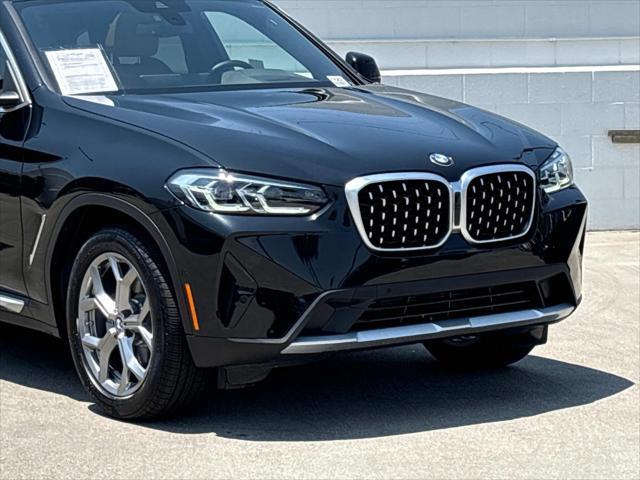 used 2024 BMW X4 car, priced at $48,820