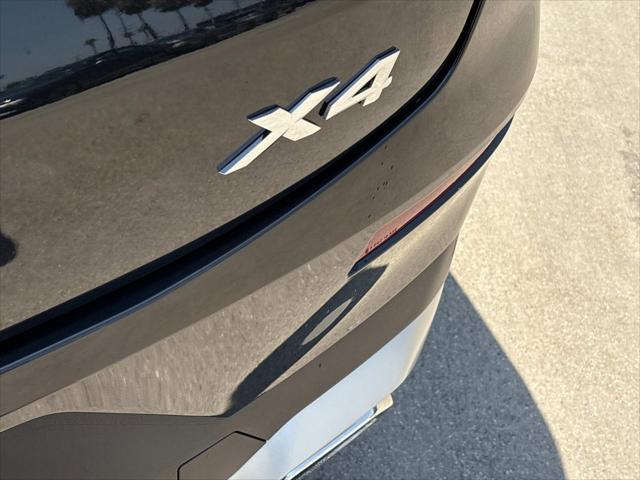 used 2024 BMW X4 car, priced at $48,820
