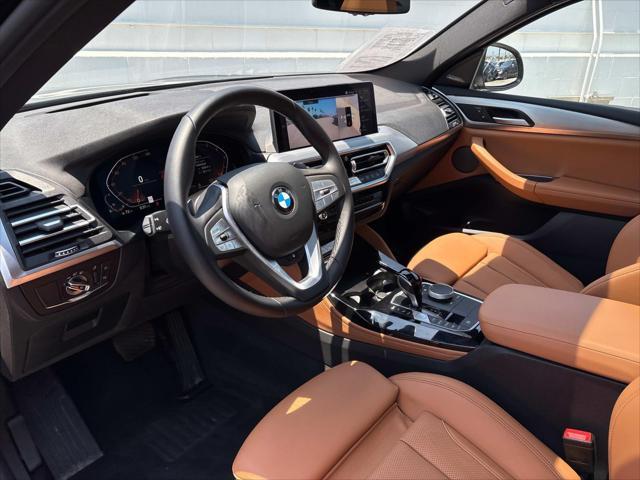 used 2024 BMW X4 car, priced at $48,820