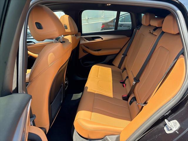used 2024 BMW X4 car, priced at $48,820