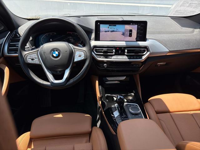 used 2024 BMW X4 car, priced at $48,820