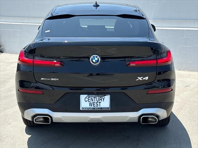 used 2024 BMW X4 car, priced at $48,820