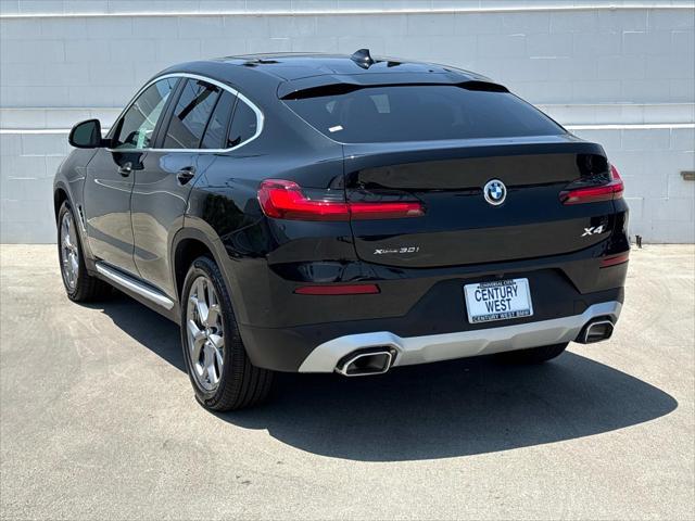 used 2024 BMW X4 car, priced at $48,820