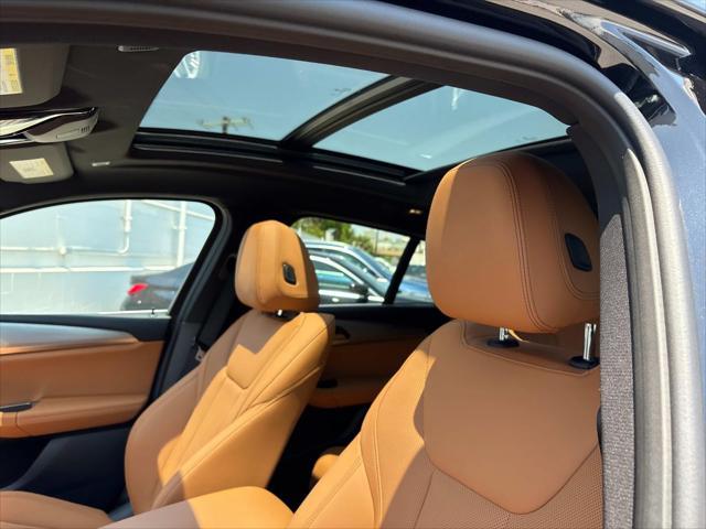 used 2024 BMW X4 car, priced at $48,820
