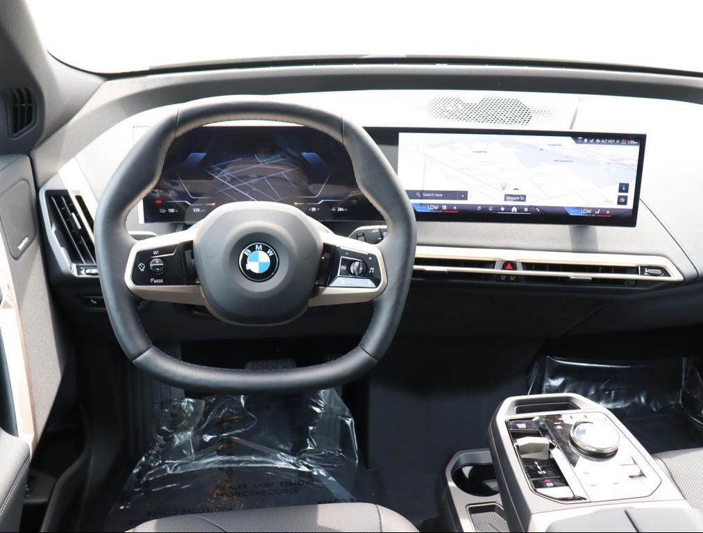 new 2026 BMW iX car, priced at $81,670