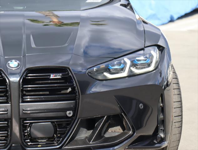 used 2022 BMW M4 car, priced at $73,880