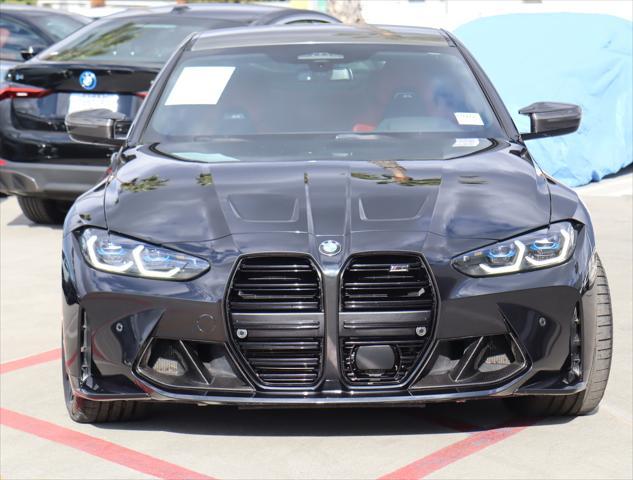 used 2022 BMW M4 car, priced at $73,880