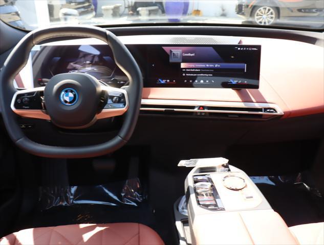 new 2025 BMW iX car, priced at $104,680