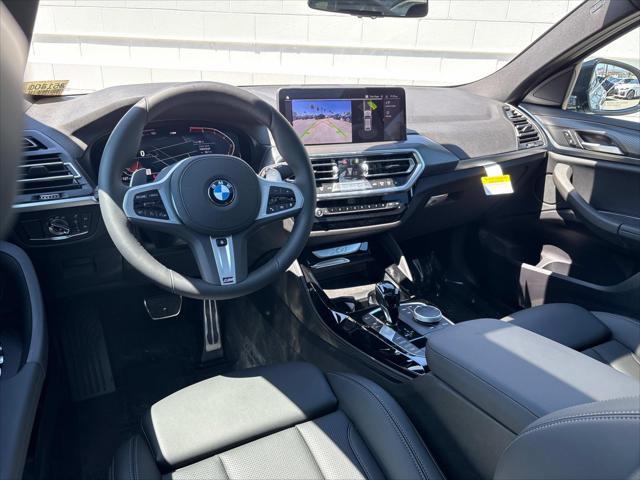 new 2025 BMW X4 car, priced at $61,585