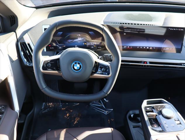 new 2025 BMW iX car, priced at $90,625