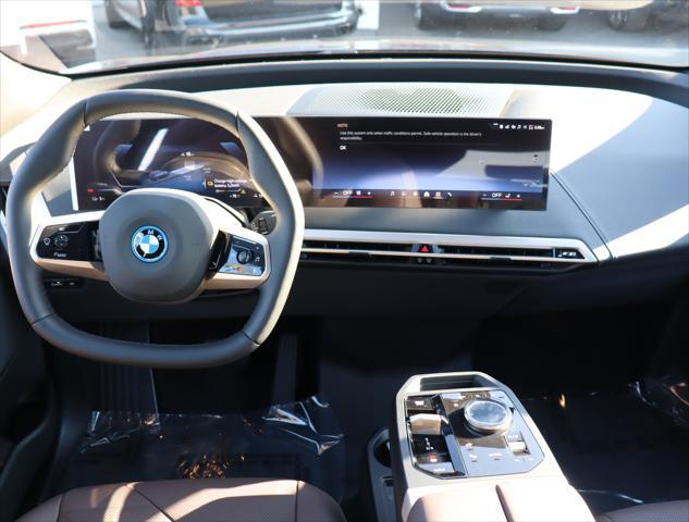 new 2025 BMW iX car, priced at $90,625