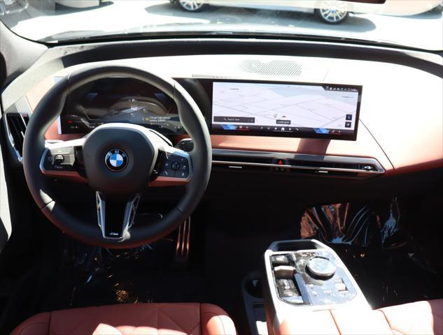 new 2026 BMW iX car, priced at $106,425