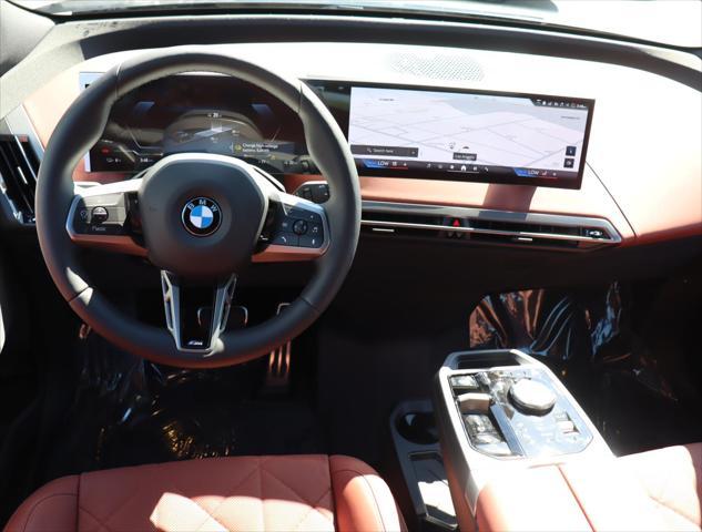 new 2026 BMW iX car, priced at $106,425