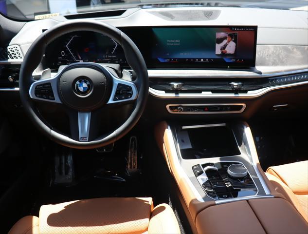 used 2024 BMW X6 car, priced at $78,995