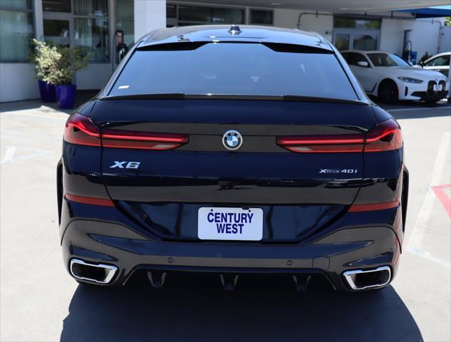 used 2024 BMW X6 car, priced at $78,995