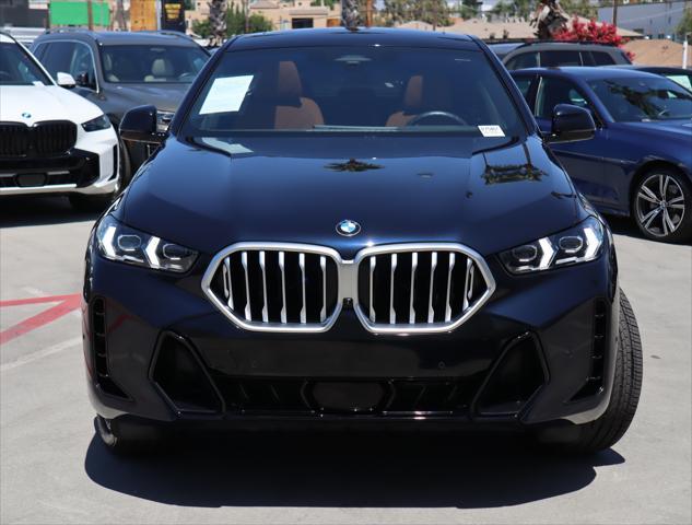 used 2024 BMW X6 car, priced at $78,995