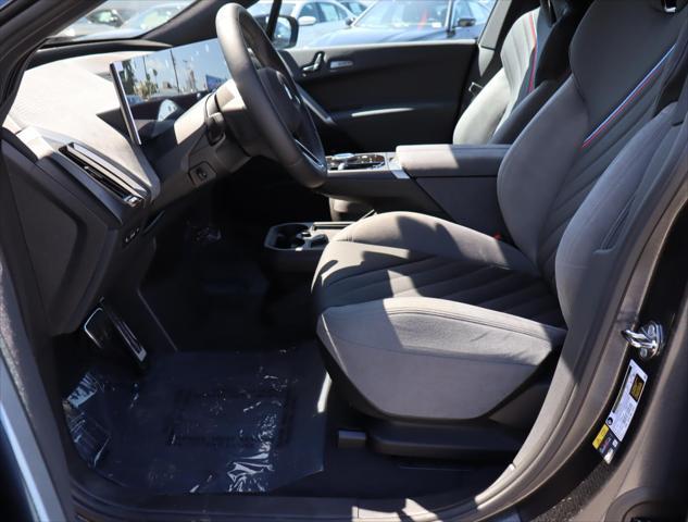 new 2026 BMW iX car, priced at $84,625