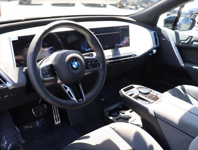 new 2026 BMW iX car, priced at $84,625