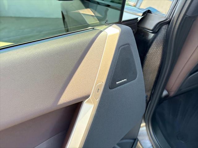 used 2025 BMW iX car, priced at $68,825
