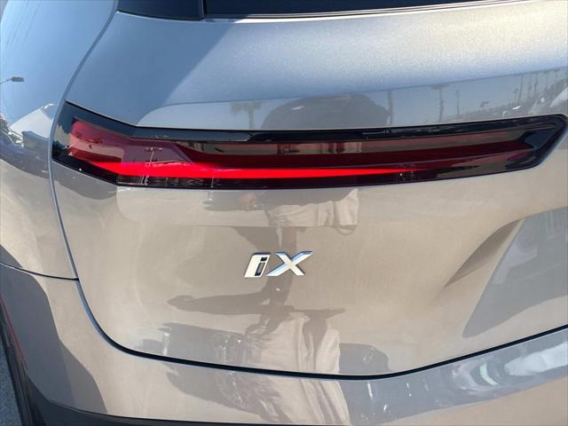 used 2025 BMW iX car, priced at $68,825