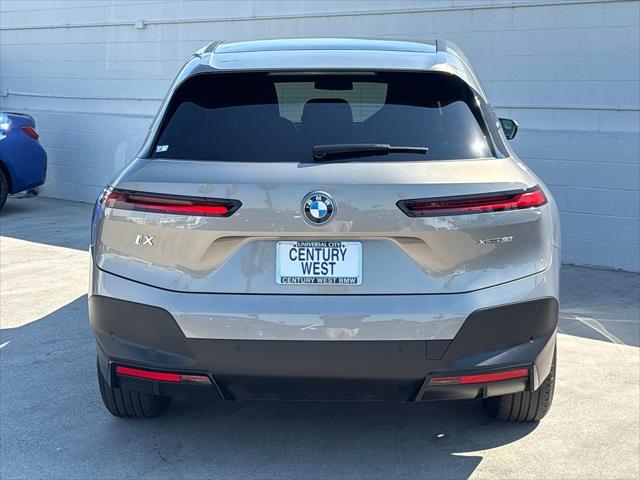used 2025 BMW iX car, priced at $68,825