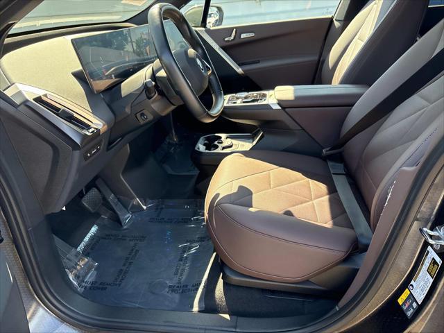 used 2025 BMW iX car, priced at $68,825