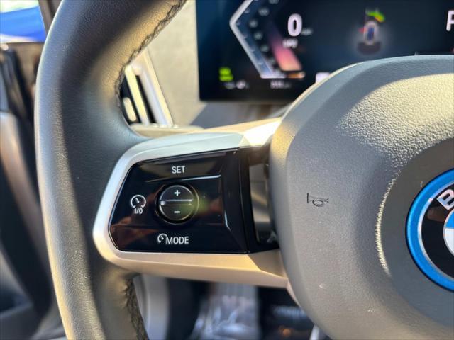 used 2025 BMW iX car, priced at $68,825
