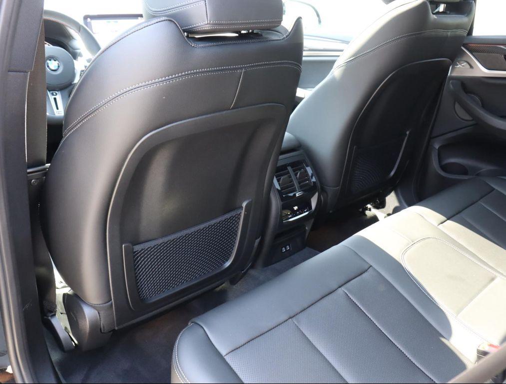 new 2025 BMW X4 car, priced at $75,000