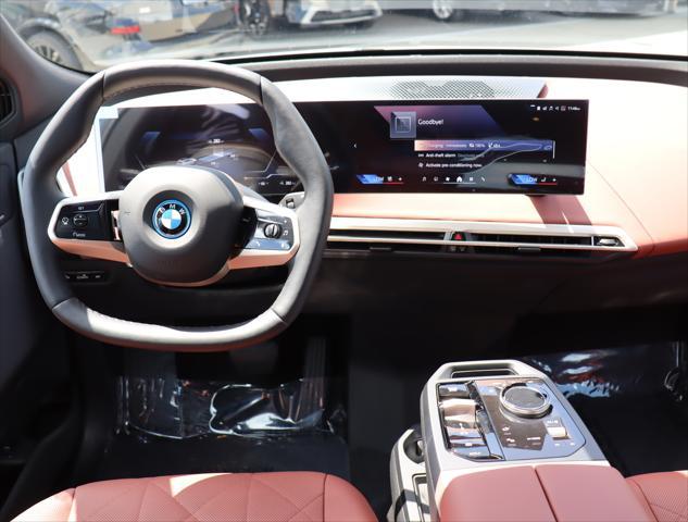 new 2025 BMW iX car, priced at $98,345