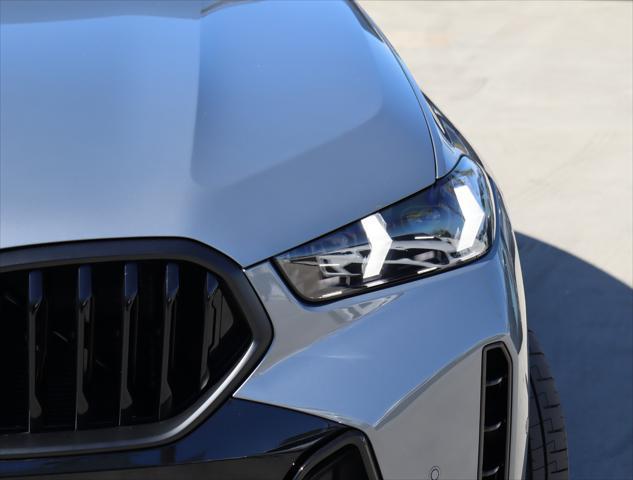 new 2025 BMW X6 car, priced at $83,900